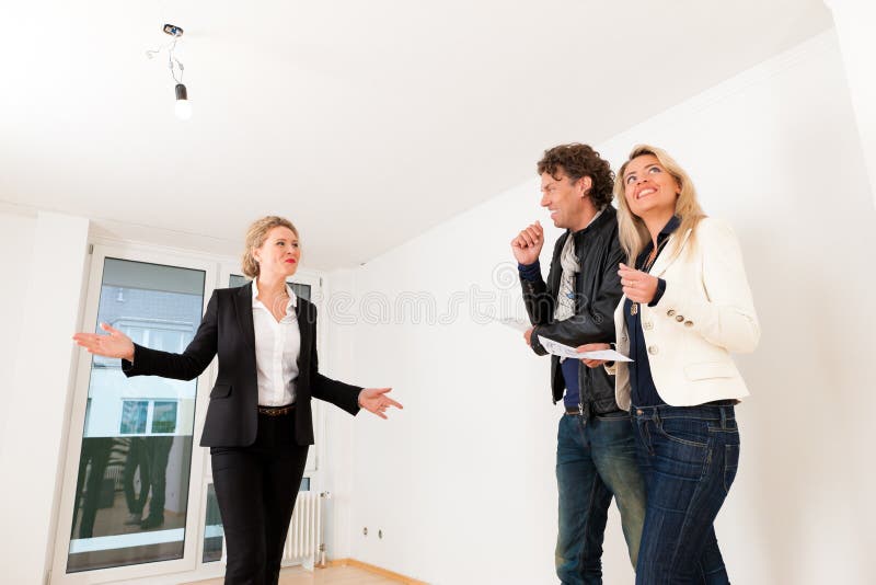 Young couple looking for real estate with female realtor stock photos Young couple looking for real estate with female realtor stock photos