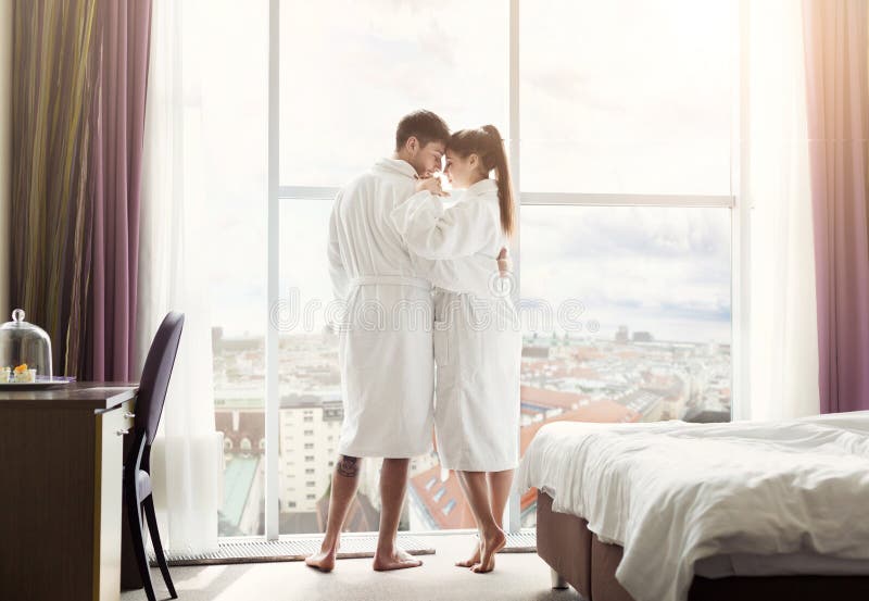 Young Happy Couple In Hotel Room In The Morning Stock Photo Image of