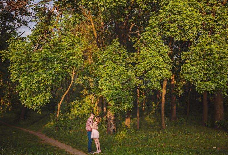 young couple in love together on nature