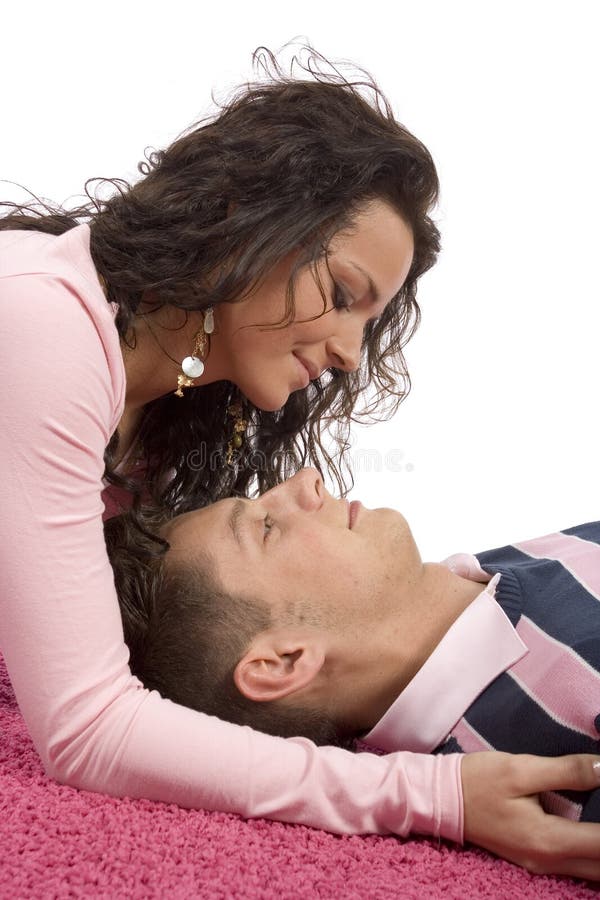 Young Couple Lying On The Pink Carpet Picture