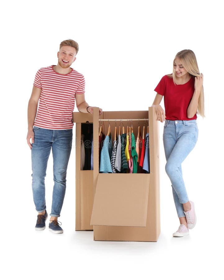 Young Couple Near Wardrobe Boxes on White Stock Image Image of