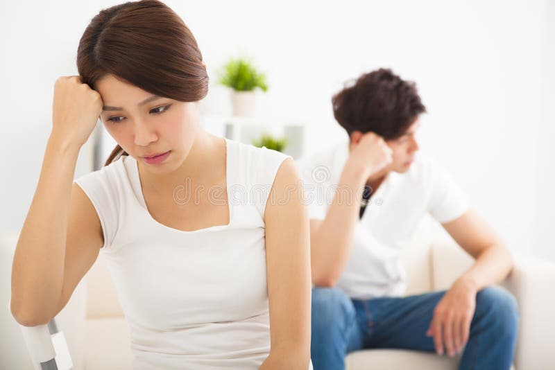 Young Couple not talking after fight in living room