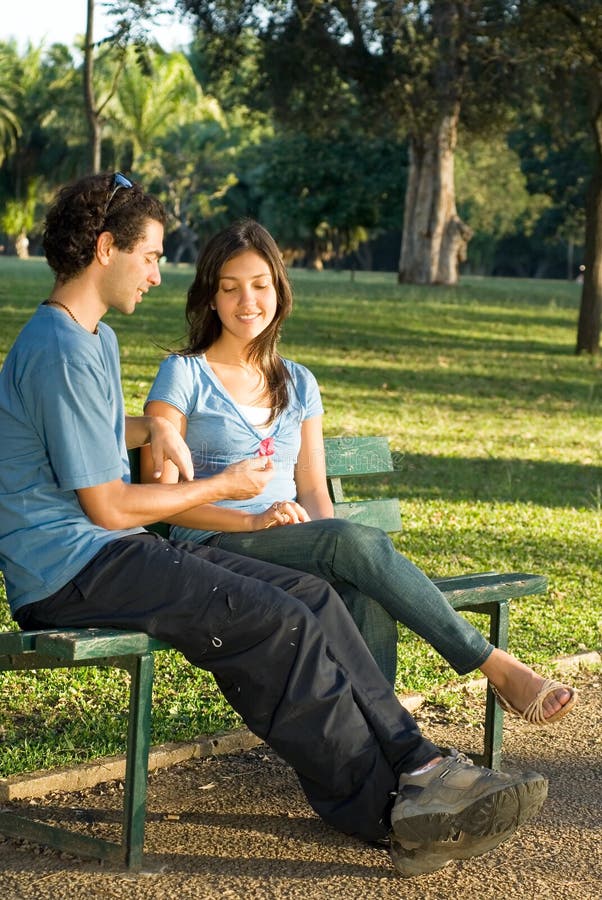 Young Couple on a Park Bench - Vertical