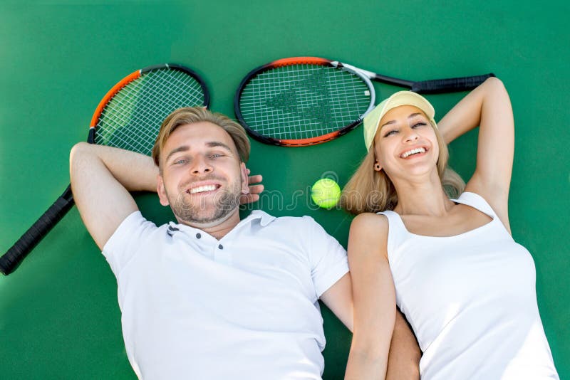 Young Couple Playing Tennis Stock Photo - Image of activity, couple ...