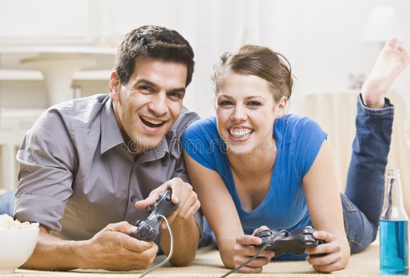 Couple playing games stock image. Image of girlfriend - 132760653