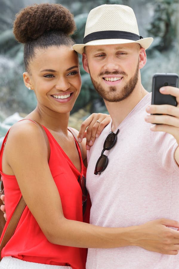 Funny Curly Male Youngster and His Girlfriend Pose for Making Selfie  Portrait Against Blurred Nature Background, Have Positive Exp Stock Image -  Image of girlfriend, relaxation: 128075067
