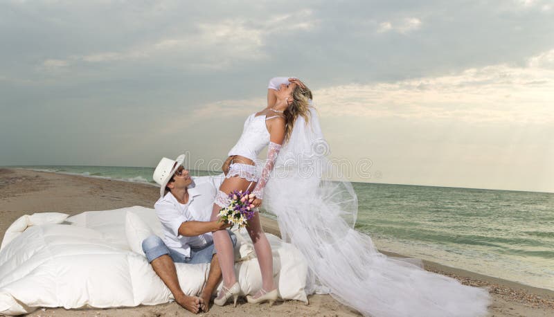 Young couple resting in bed stock photos