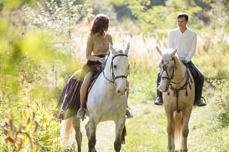 Young couple riding