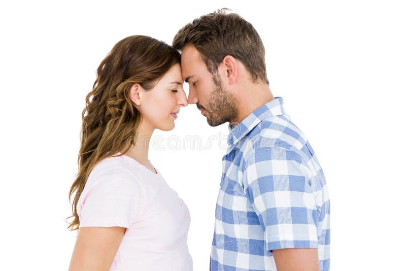 Young couple rubbing nose stock photo. Image of head 68126886