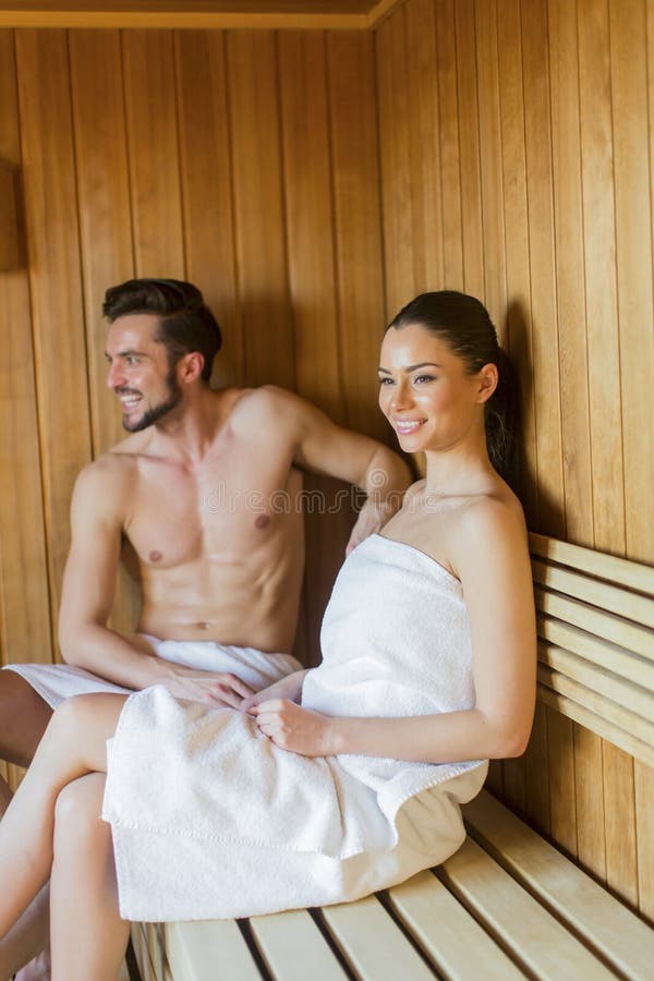 Young couple in the sauna stock photo. Image of caucasian 50849464