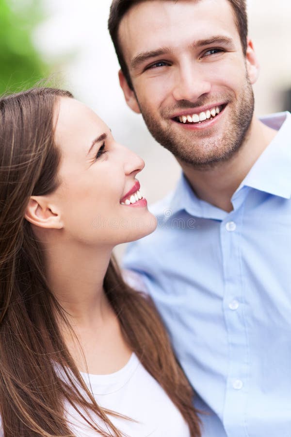 Young couple smiling stock photo. Image of affection - 43749536