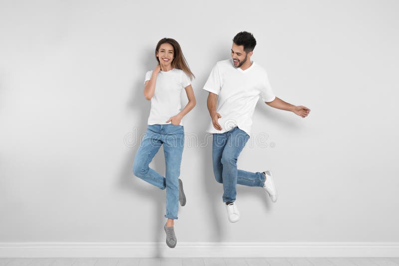Full Body Photo Of Funky Pretty Lady Jumping High Up Celebrating Weekend  Vacation Start Wear Casual Green Shirt Yellow Pants Sneakers Isolated Blue  Color Background Stock Photo - Download Image Now - iStock
