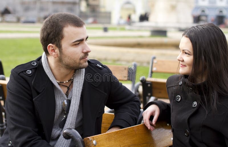Young couple talking stock photography