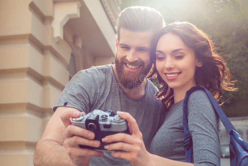 Young couple tourists city walk together vacation royalty free stock images Young couple tourists city walk together vacation royalty free stock images