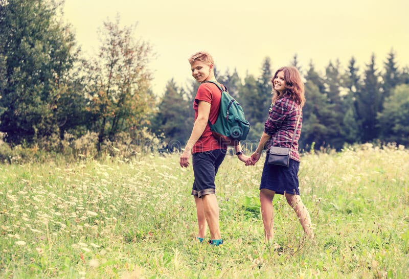 Happy Lesbian Couple Walking In Nature