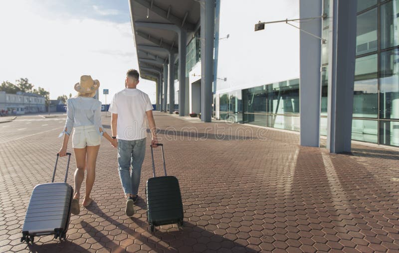 Young Couple Walking At Airport Travel And Tourism Stock Photo Image