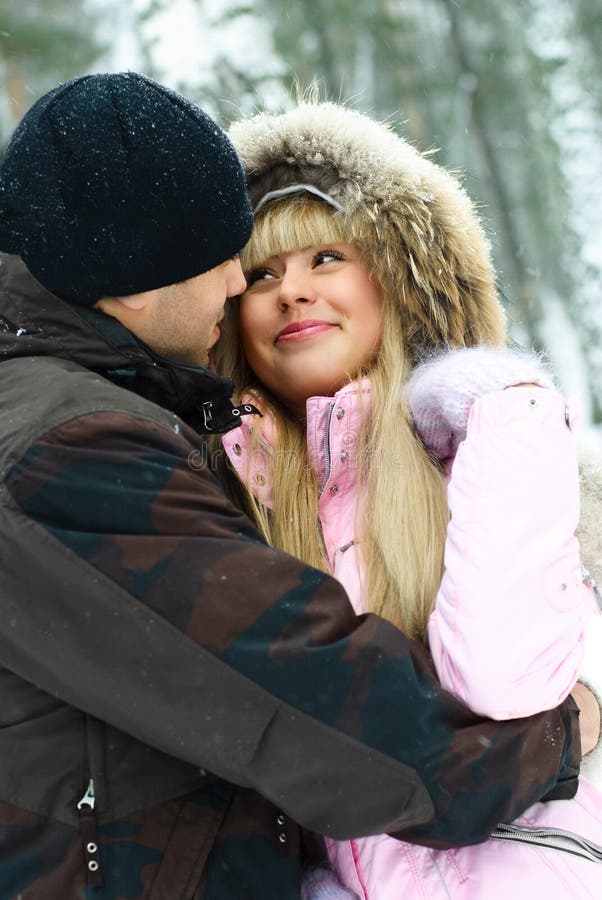 Young couple in winter park