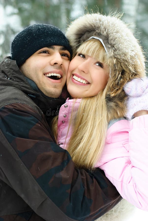 Young couple in winter park