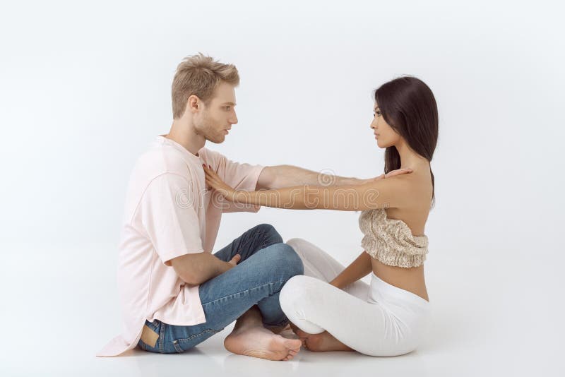 Young couple in yoga pose