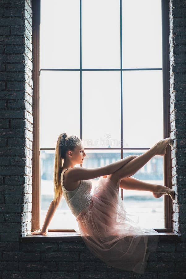 Young Dancer Posing at Camera Window Stock Photo of dancewear: 79209332