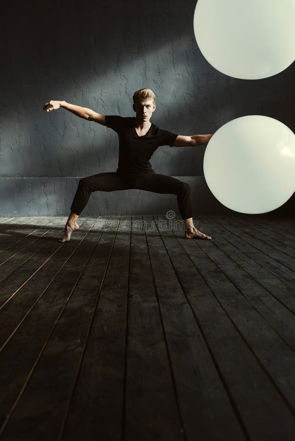 Young Dancer Training in the Dark Lighted Room Stock Image Image of