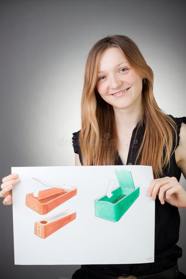 Young Design Engineer Woman Shows a Design Plan