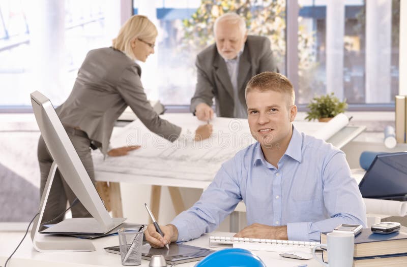 Young designer working on drawing pad royalty free stock image