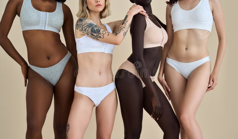 https://thumbs.dreamstime.com/b/young-diverse-women-wearing-underwear-standing-row-beige-close-up-beauty-shot-multicultural-girls-four-models-comfortable-292738043.jpg