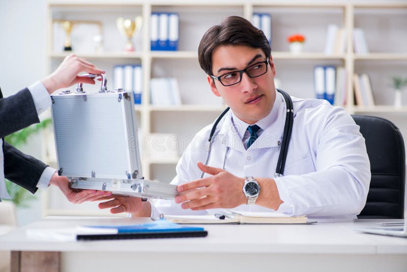 The Young Doctor In Medical Insurance Fraud Concept Stock Image - Image of health, accepting ...