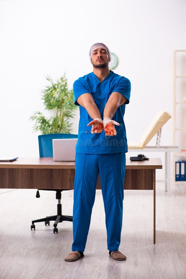 Young male doctor surgeon in fatal negligence concept. Young doctor surgeon in fatal negligence concept stock photo Young male doctor surgeon in fatal negligence concept. Young doctor surgeon in fatal negligence concept stock photo