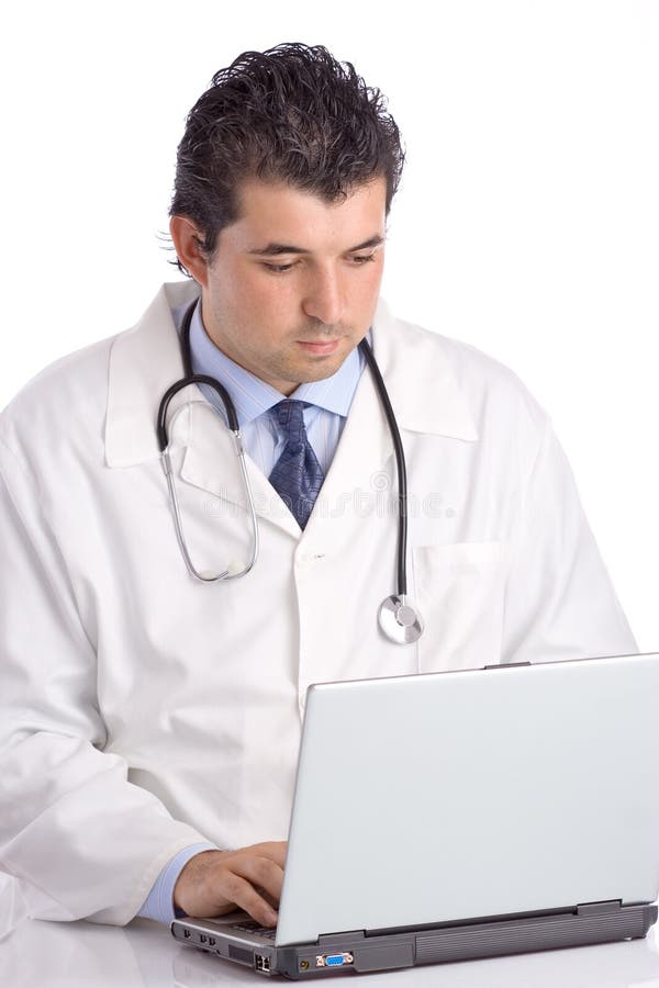 Young doctor working on a laptop stock photo