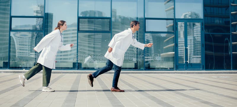 Young doctors rush to an emergency call.