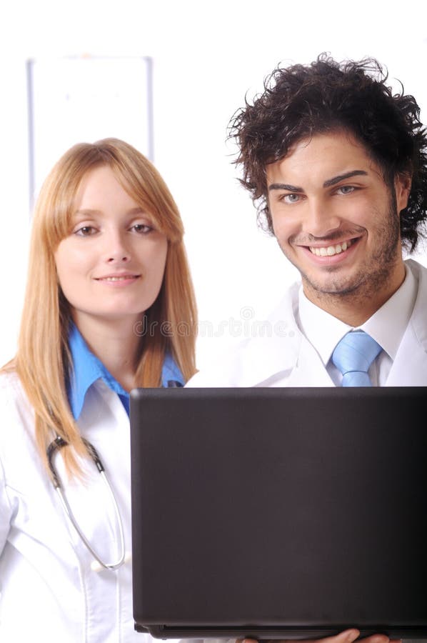 Young doctors use laptop