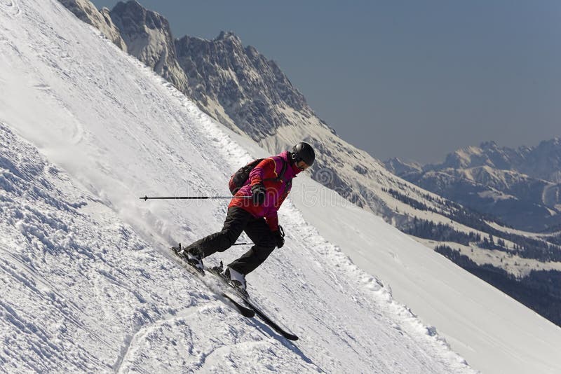 Young downhill skier stock image Young downhill skier stock image