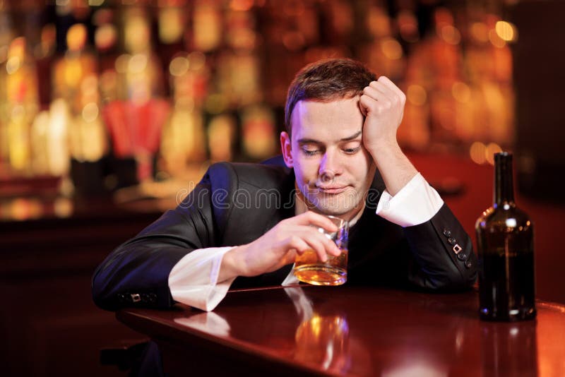 Young drunk man drinking stock photo. Image of depressed - 13191294
