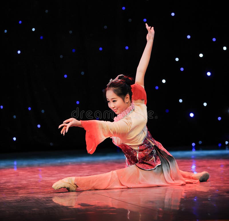 Young and energetic girl in a solo dance stock photography Young and energetic girl in a solo dance stock photography
