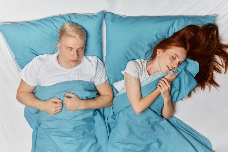 Young fair-haired man has a nightmare, horrible dream. stock photos Young fair-haired man has a nightmare, horrible dream. stock photos