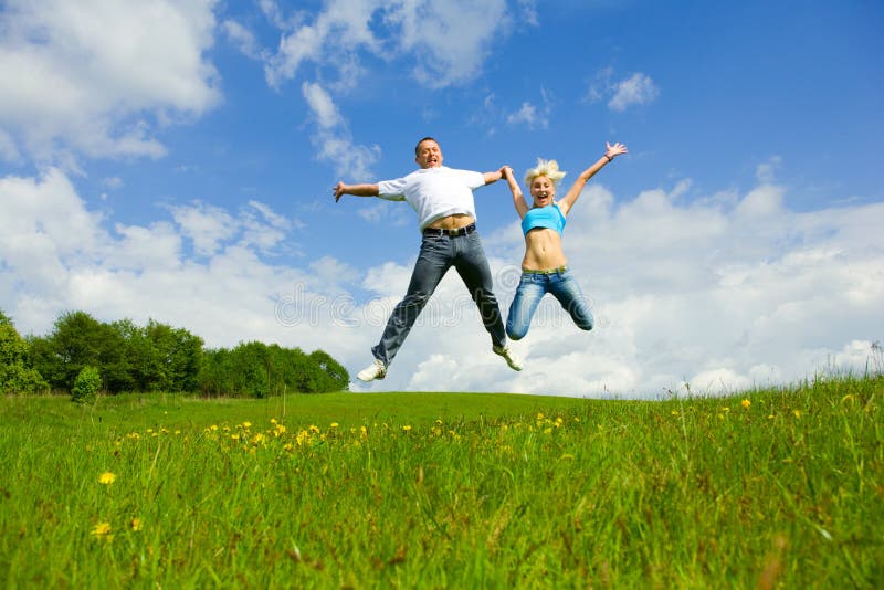 Young family jumping