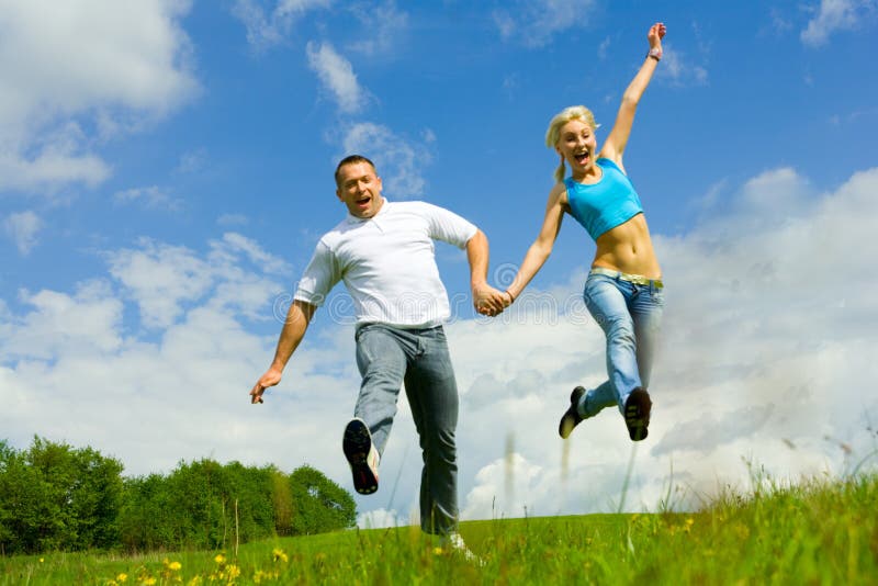 Young family jumping