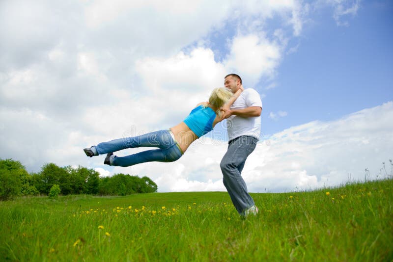 Young family jumping