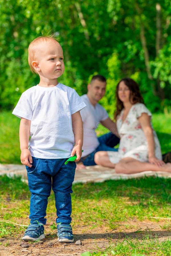 Young family in the park at a picnic, close-up portrait royalty free stock image Young family in the park at a picnic, close-up portrait royalty free stock image