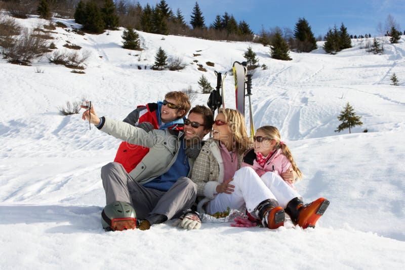 Young Family On Ski Vacation