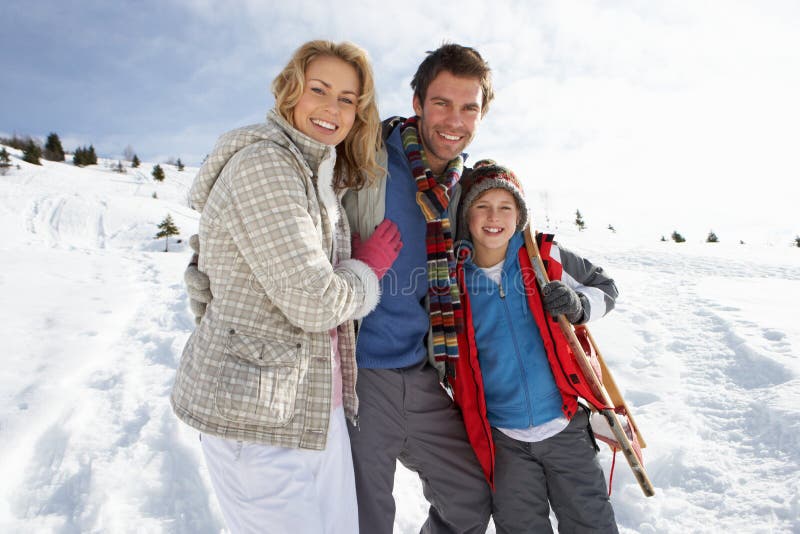 Young Family On Winter Vacation