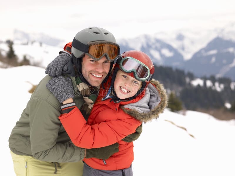 Young Father And Son On Winter Vacation