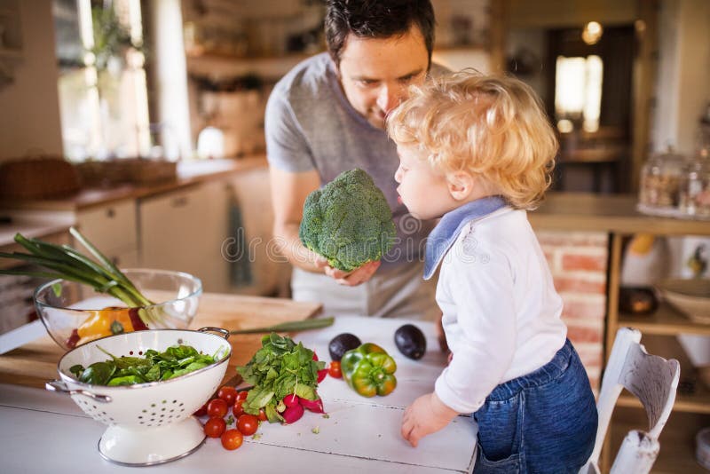 Young Father with a Toddler Boy Cooking. Stock Image - Image of love ...