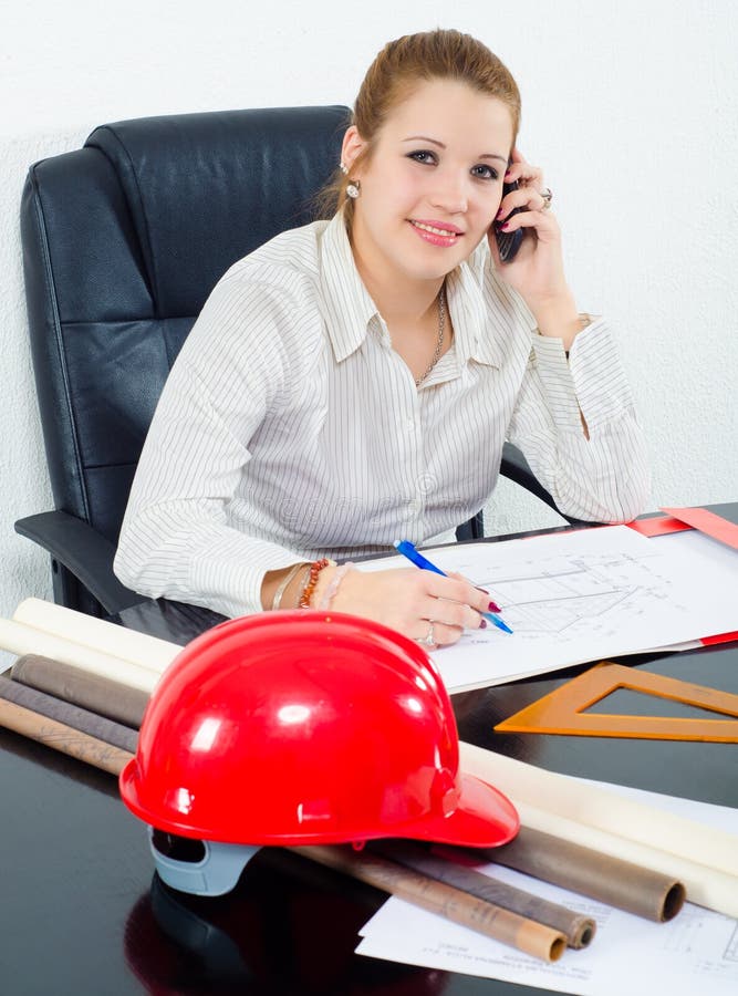 Young female architect working on the project