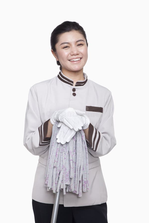 Young Female Caretaker Cleaning with Bucket and Mop, Studio Shot Stock