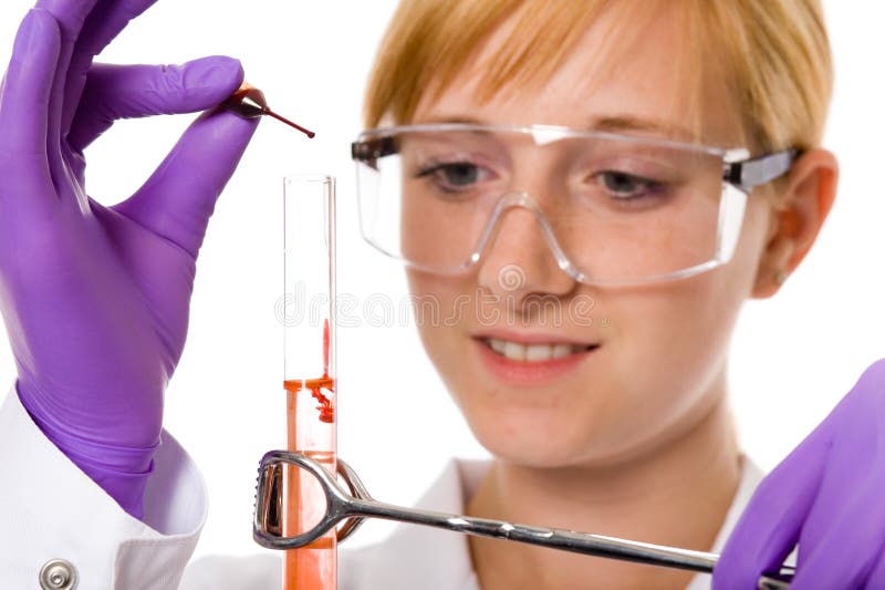 Young female chemist doing some research, isolated royalty free stock photos Young female chemist doing some research, isolated royalty free stock photos