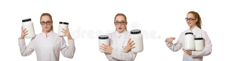 Young female doctor holding jar of protein isolated on white stock images Young female doctor holding jar of protein isolated on white stock images