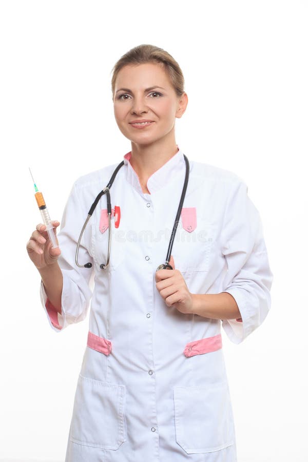 Young female doctor holding a syringe